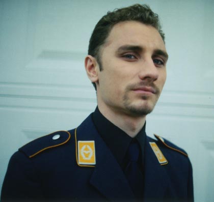 Erol Yundem as the Minister of Defense